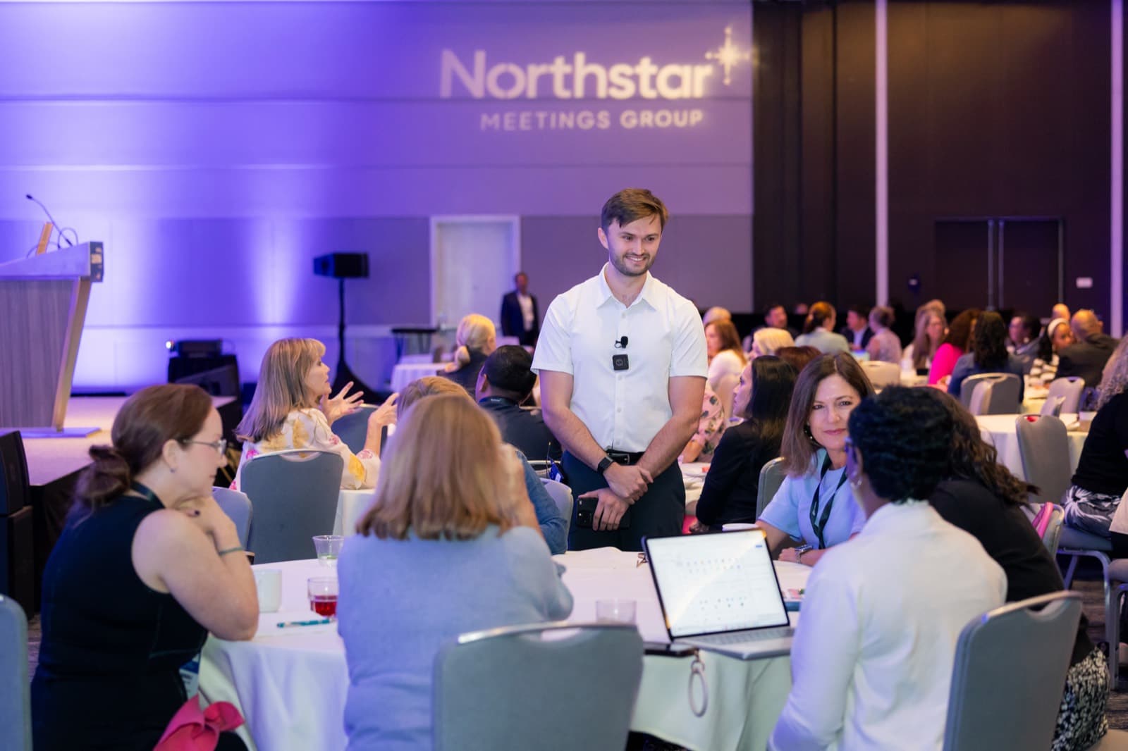 Noah Cheyer working with a table of event professionals during his session at Destination California by Northstar Meetings Group
